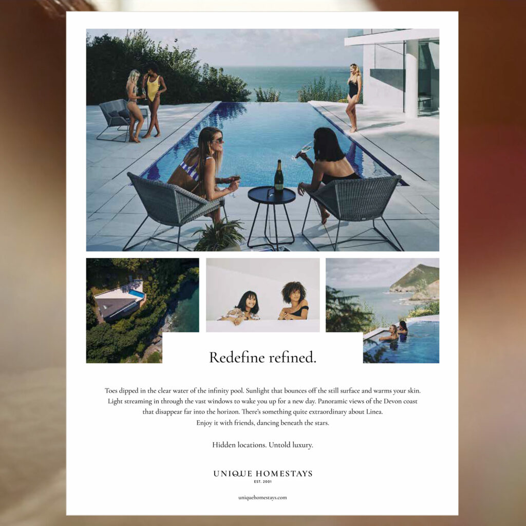 A Unique Homestays press advert headed "Redefine refined", showing guests around an infinity pool overlooking the Devon coast.