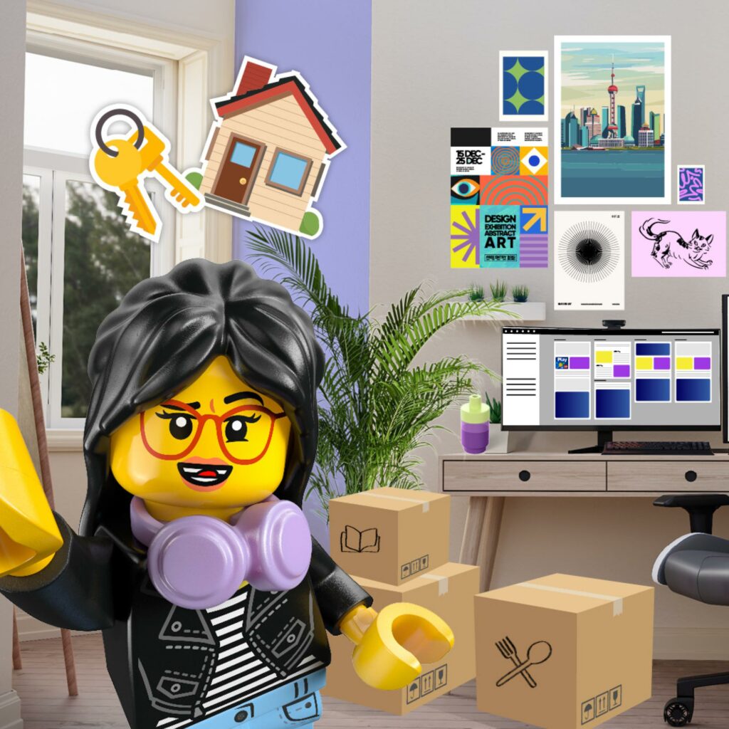 Ming taking a selfie in her new room, surrounded by moving boxes, a desk and a mood board