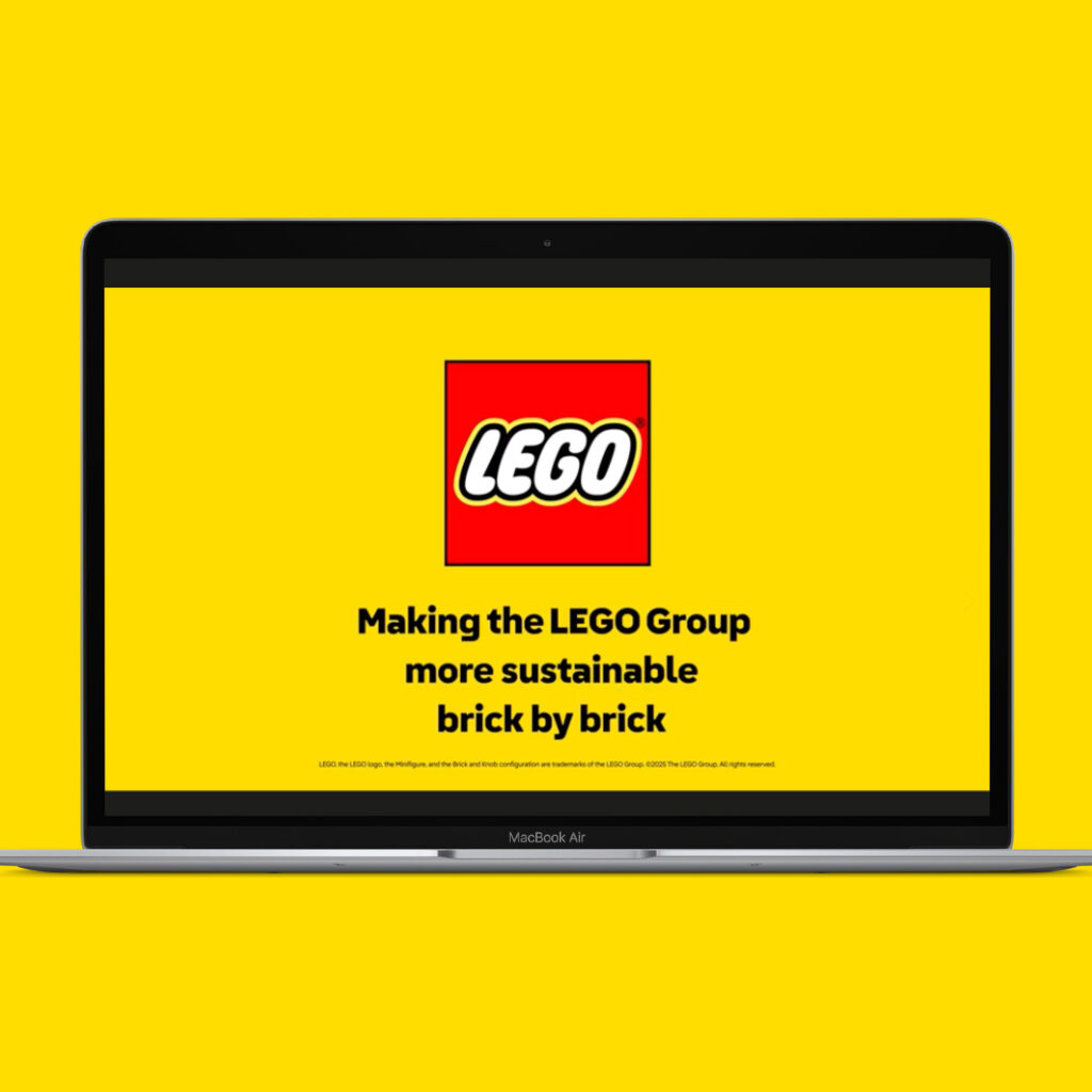 Title card on a laptop reading "Making the LEGO Group more sustainable brick by brick"